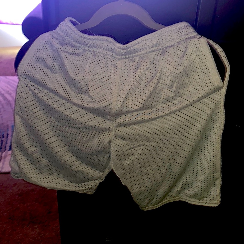 The color is silver the brand is athletic works size XL/XG (14-16